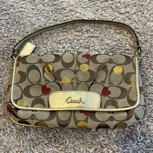 Vintage Coach clutch, heart print with gold lining and trim
